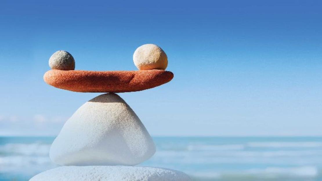 Stones on top of each other in the water