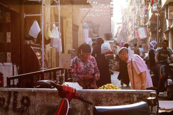 Photo of a Woman Selling Lemons in Cairo
