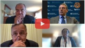 Four people talking in a video conference