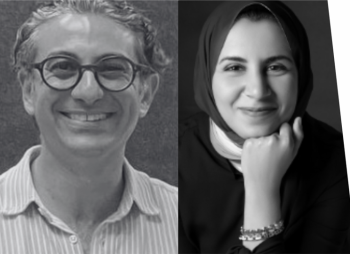 A man and a woman smiling