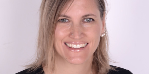 A woman smiling