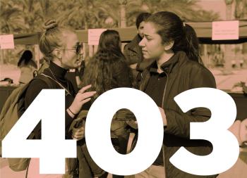 two girls talking. 403 written in white on the picture.