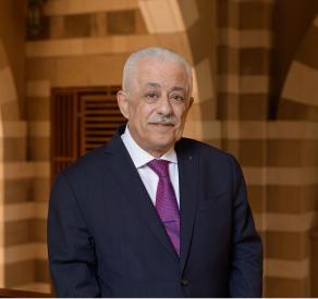 A man wearing a suit and tie