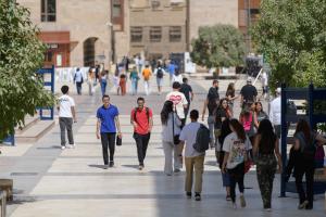 A group of students walking on campus