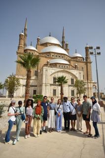 Foreign males and females in front of the Citadel