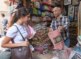 A girl shopping in Muizz street