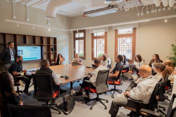 a group of students and industry partners attending a round table
