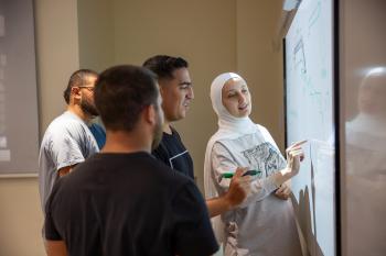 students and faculty in classroom
