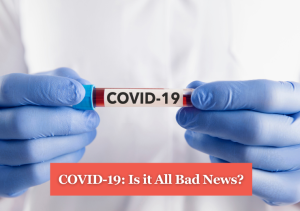 Two hands wearing blue surgical gloves holding a test tube that says COVID-19. Text: COVID-19: Is it All Bad News?