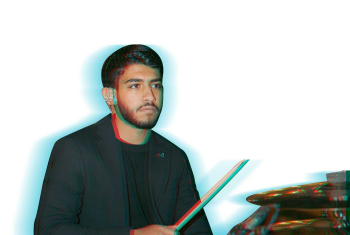 David Maged plays the drums