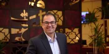 Ammar Baig in a suit