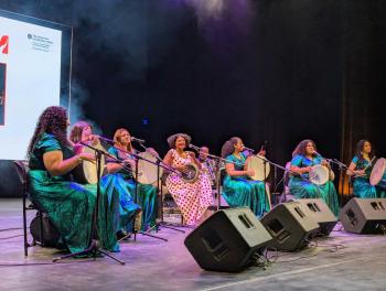 Musicians on stage playing together 