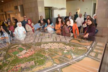 Dean of AUC Libraries Lamia Eid leading a tour for journalists in the newly transformed library 