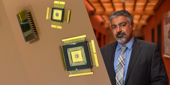 two biochips on the left; yehea in suit on the right.