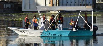 Georgetown University Qatar students on a Very Nile boat for a NIle clean-up