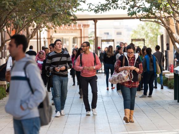 Students walking in from AUC Bus Gate