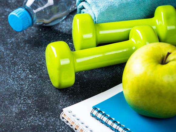 apple, dumbell and water bottle