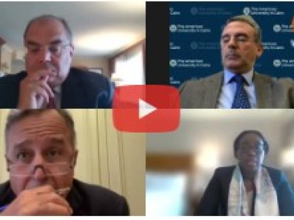 Four people talking in a video conference