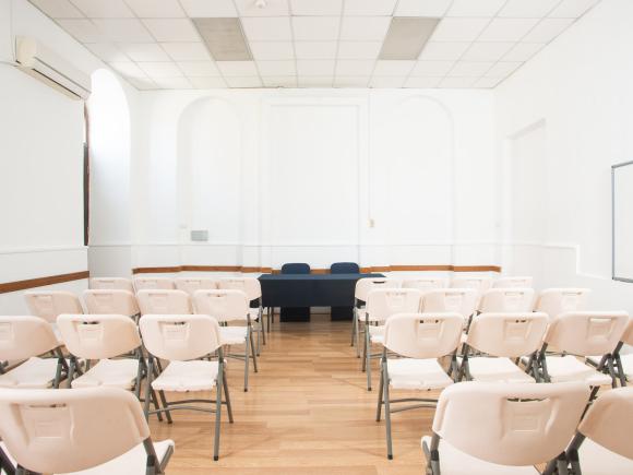 Chairs in a room and a table