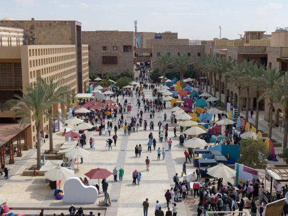 People walking in the plaza