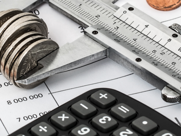 picture of money and calculator on a table