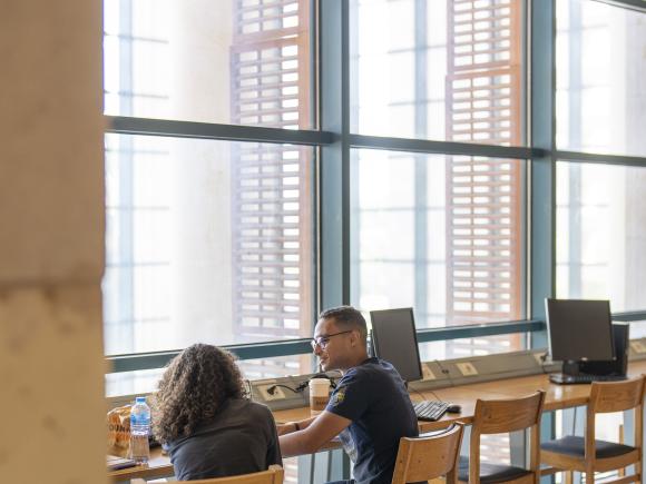 Students studying inside the library