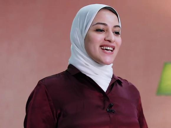 Veiled girl smiling
