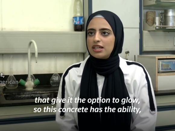 Veiled girl in a lab