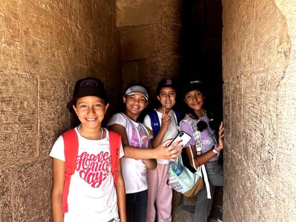 Kids smiling at monumental site