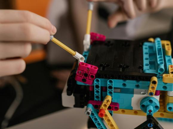 Kids with lego robot