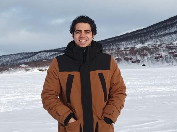 Study abroad student smiling in snowy Helsinki during his study abroad semester