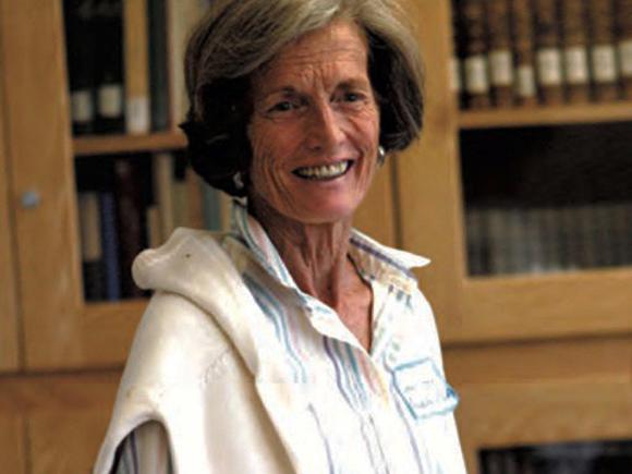 A woman similing at the camera- Ann Kerr