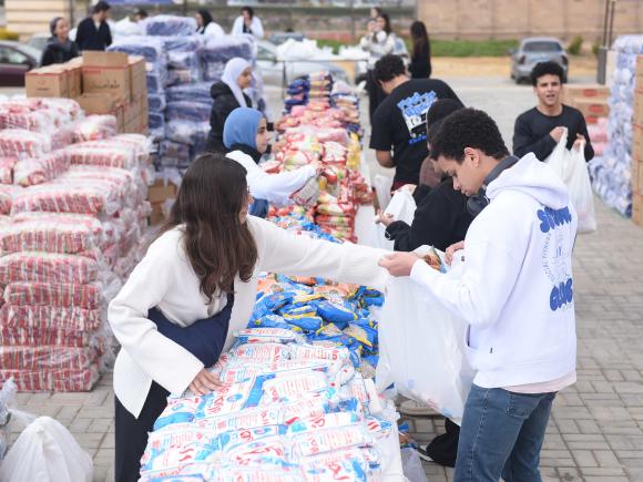 AUC students assemble a record 6000 food packs for families in need in Ramadan 2026