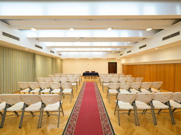 A room that has chairs in theater-style