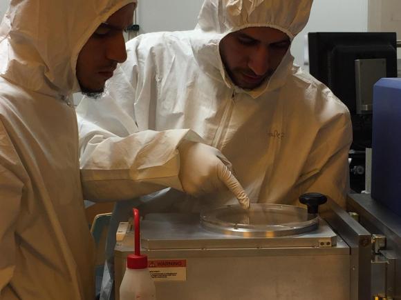 Graduate students Ahmad Amer and Ahmed Hafez work in the lab as part of Nageh Allam's team researching solar cell technology with their MIT counterparts
