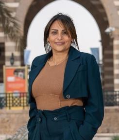 lady wearing formal smiling