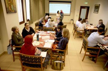 faculty sitting on table
