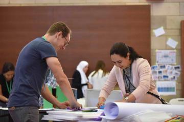 two faculty working on a project
