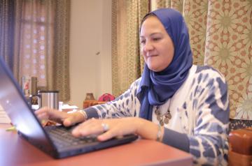 faculty with laptop