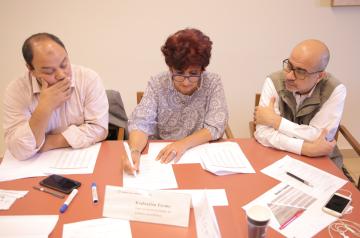 Faculty around table
