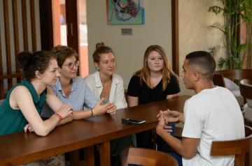 AUC Students talking on campus.