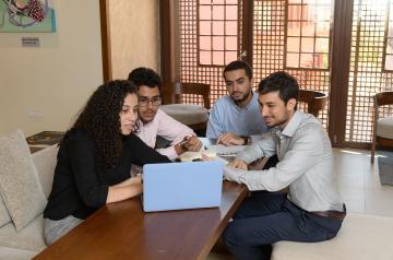 AUC students researching in the library