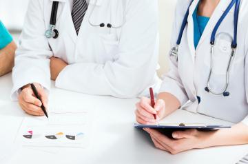 doctors writing