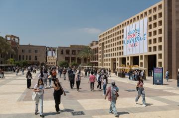 AUC Campus with students walking