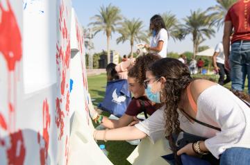 AUC students painting