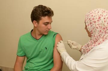 Student receiving vaccination