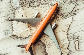 Airplane and world map