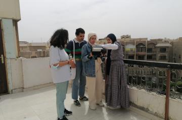 auc students filming camera workshop