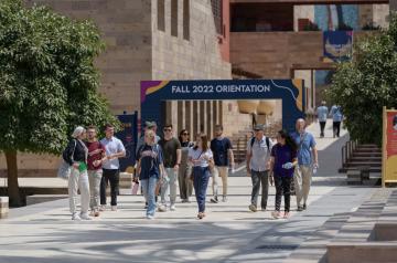 group of students walking on campus
