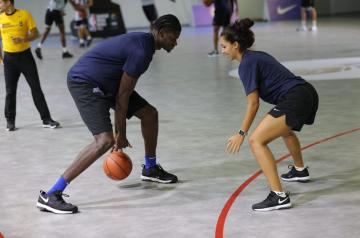 Nada Gasser '19 plays basketball with Mo Bamba